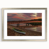 Textured art depicting abstract scenery of Maine in muted earth tones on a framed silver mat, suitable for bedroom decor.