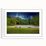 Abstract art print of Charlotte skyline in muted gray and blue tones on a framed white mat, ideal for dining room decor.