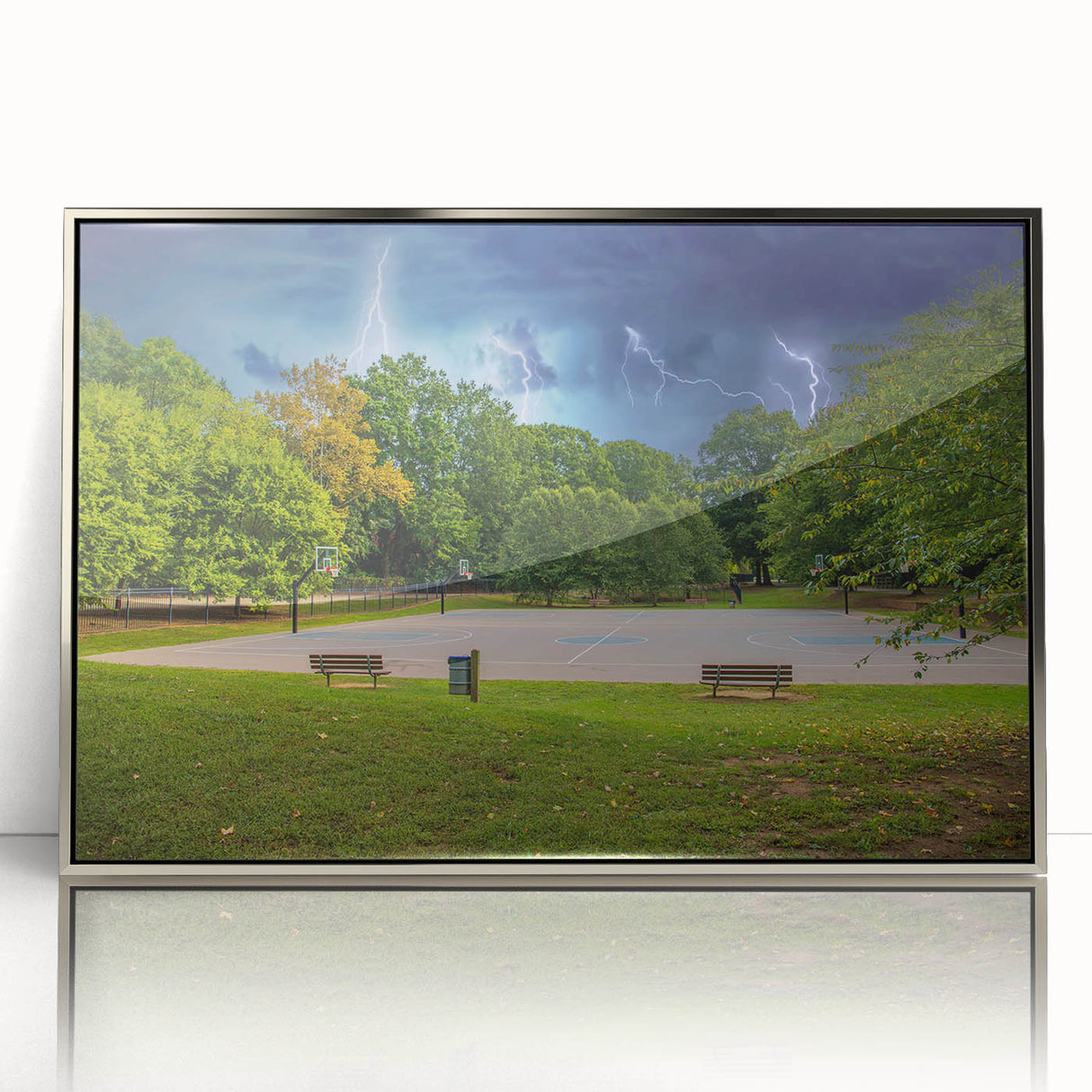 Mid-century modernist art of Charlotte skyline in muted gray and blue, acrylic print framed in silver.