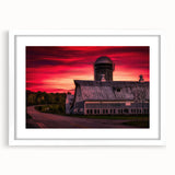 Abstract art print of Vermont scenery in muted green and blue tones on a framed white mat, ideal for dining room decor.