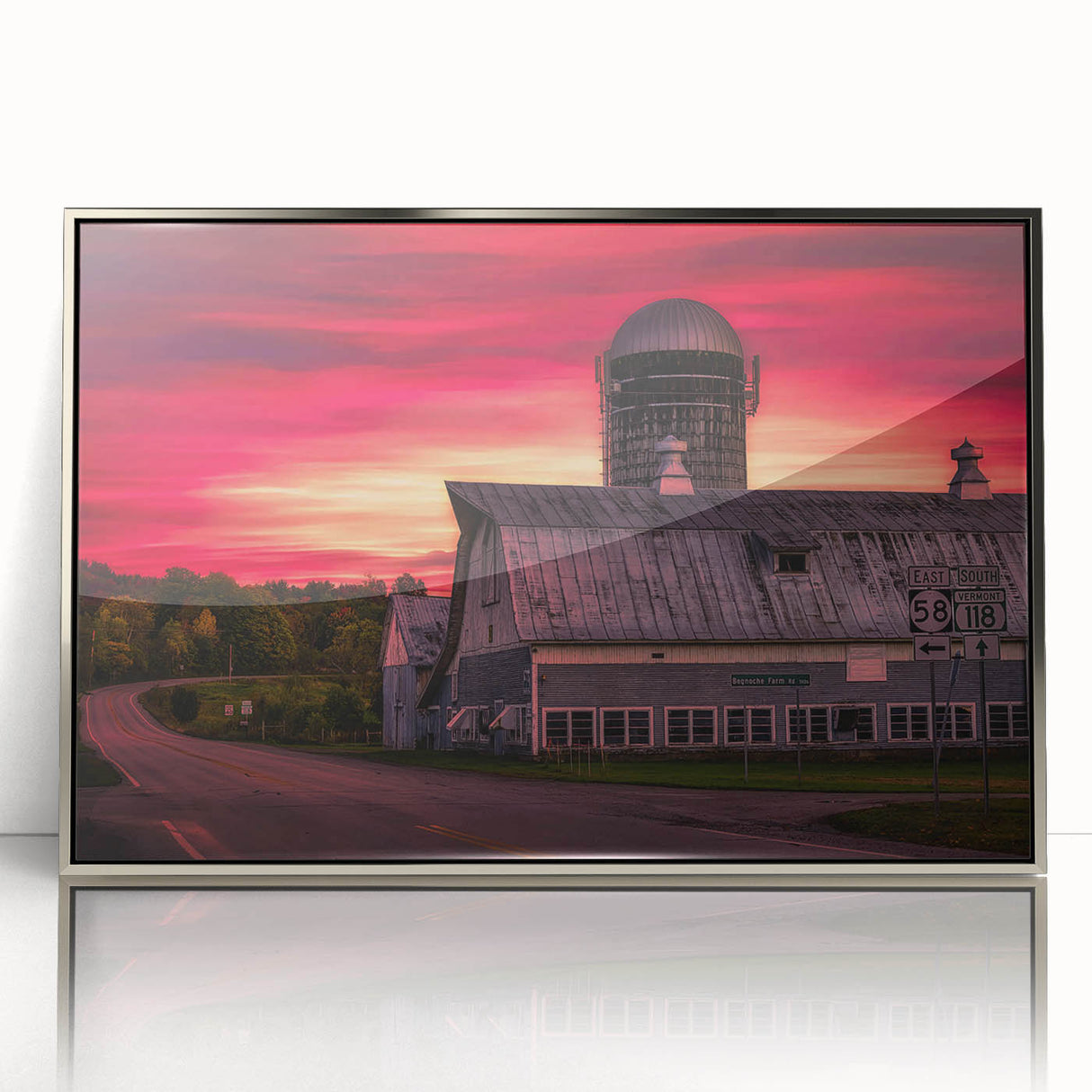 Mid-century modernist art depicting Vermont scenery in muted earth tones on a silver-framed acrylic print.