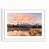 Abstract art print of the Grand Tetons in muted earth tones on a framed white mat, ideal for bedroom or dining room decor.