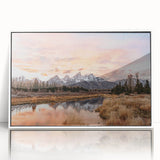 Acrylic print of the Grand Tetons with a white frame, featuring soft pastel colors in an art deco style.