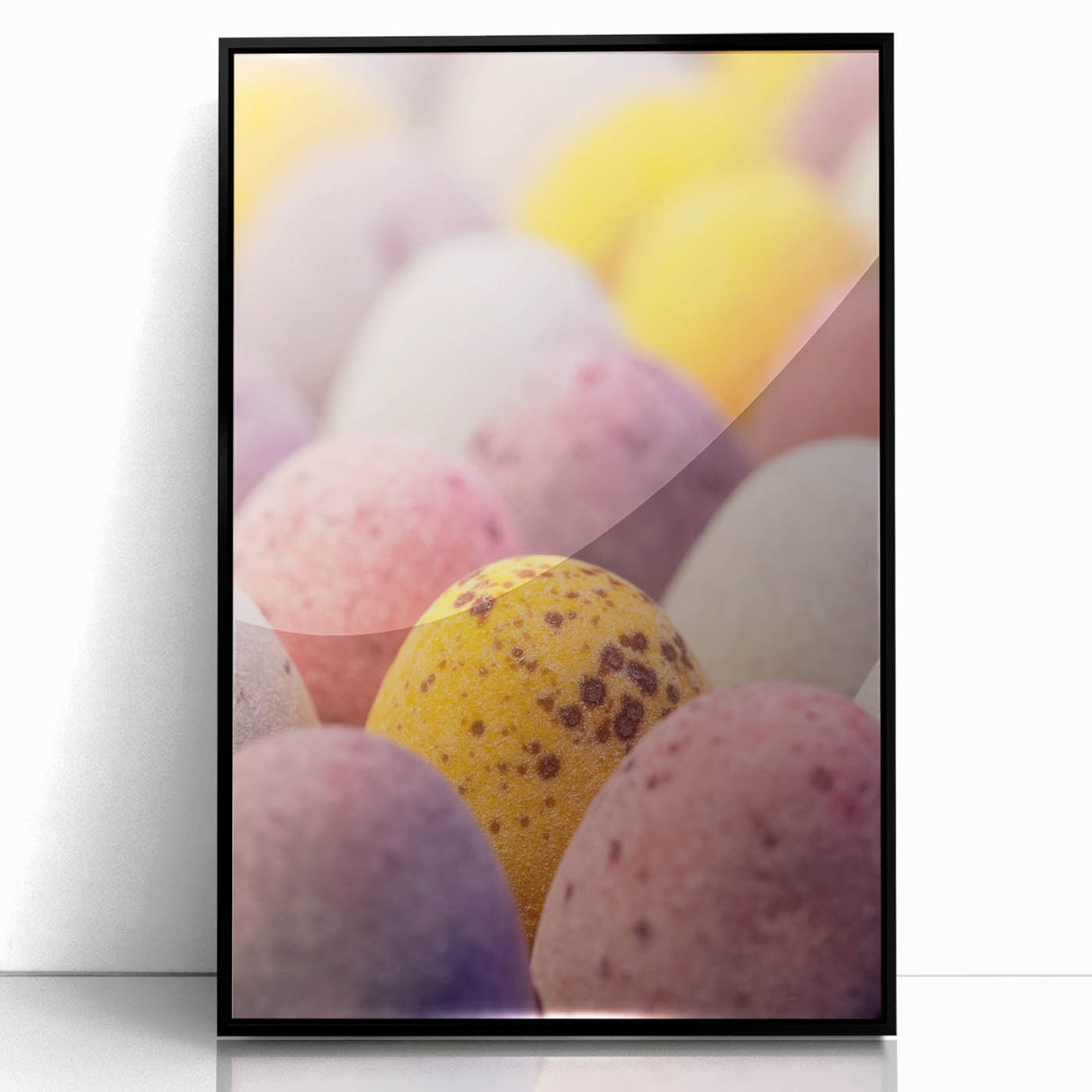 Large abstract wall art with swirls in spring hues on a black acrylic frame, ideal for modern living room decor.