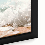 Close-up of black wall art featuring a textured, colorful abstract design on a large framed canvas.