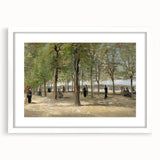 Abstract art print featuring swirling shades of blue and yellow on a white framed canvas.