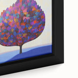 Close-up of a vibrant abstract floral framed canvas showcasing intricate details in bold colors like pink, blue, and yellow, perfect for modern home decor.