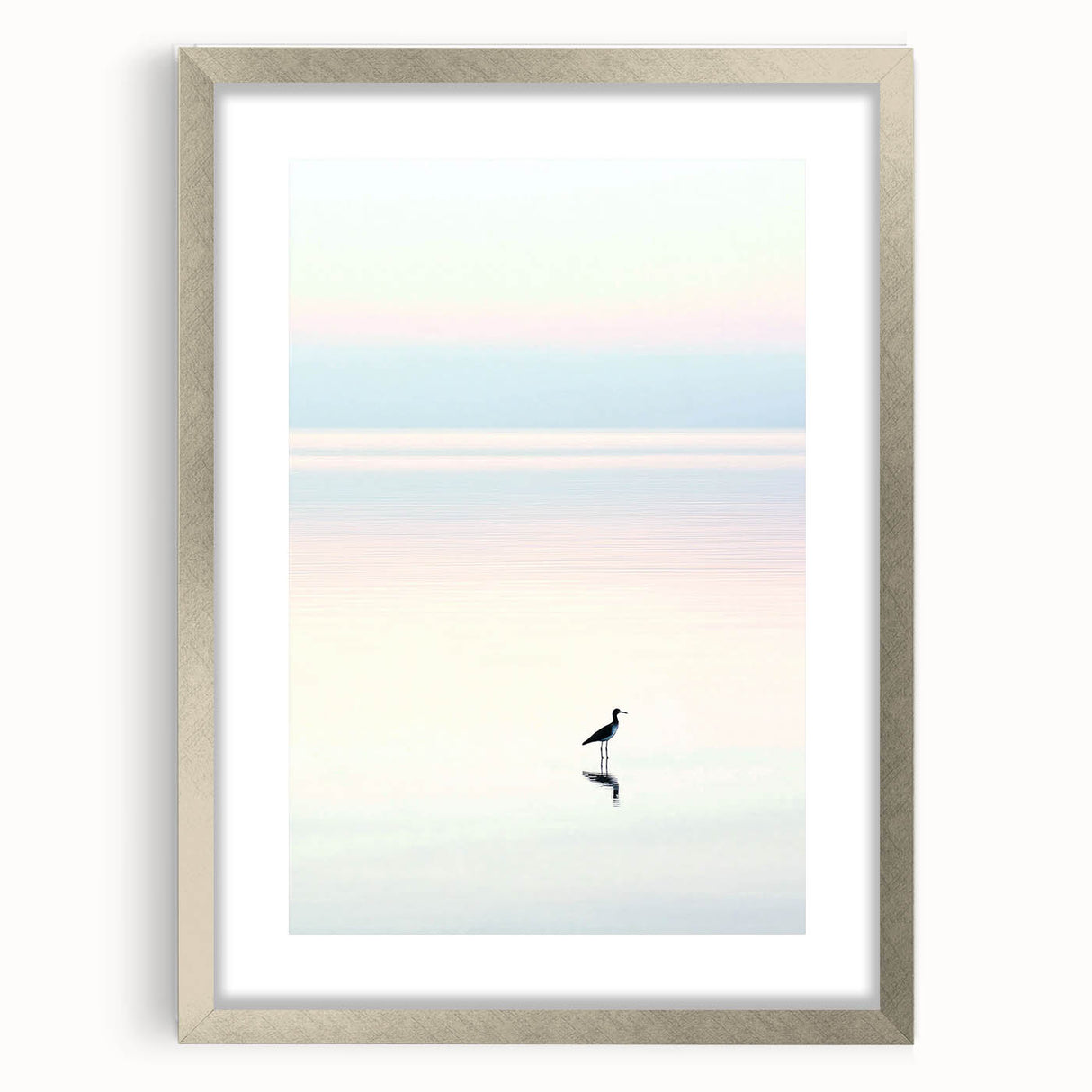 Abstract landscape art print framed in a sleek silver frame with a white mat, showcasing soft blues and greens, perfect for modern home decor.