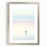 Abstract landscape art print framed in a sleek silver frame with a white mat, showcasing soft blues and greens, perfect for modern home decor.