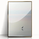 Framed acrylic artwork showcasing an abstract landscape with gold accents, set against a neutral background. This modern piece enhances contemporary home decor.