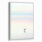 Framed canvas artwork showcasing a vibrant abstract landscape in shades of blue and green, elegantly displayed with a sleek white frame from a side view perspective. Perfect for modern home decor, adding a touch of artistic flair to any room.