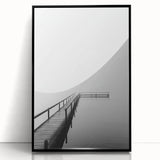 Framed acrylic artwork displaying an abstract landscape in vibrant hues of blue and green, set against a sleek black frame, ideal for modern home decor.