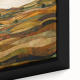 Framed canvas depicting a textured, abstract design in autumnal colors, ideal for living room decor.
