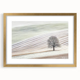 Abstract landscape artwork framed in gold, featuring a soft color palette of blues and greens, perfect for enhancing modern interior decor. The mat adds elegance and depth to the piece, making it an ideal choice for living rooms or offices.