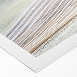 Abstract landscape canvas art showcasing vibrant hues of blue, green, and gold, ideal for modern decor, elegantly rolled and secured for shipping.