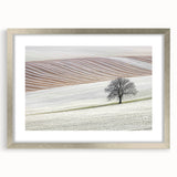 Abstract landscape artwork framed in silver, featuring soothing tones of blue and green with a mat for enhanced display, ideal for modern home decor.