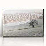Framed acrylic artwork depicting an abstract landscape in silver tones, showcasing fluid shapes and modern design elements, perfect for contemporary decor.