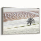 Framed abstract landscape canvas artwork with a silver frame, showcasing a serene blend of muted colors and textured patterns, perfect for modern home decor.