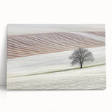 Abstract landscape canvas print showcasing vibrant colors and dynamic shapes, perfect for modern home decor. This piece leans against a wall, emphasizing its striking design and artistic flair. Ideal for adding a contemporary touch to any living space.