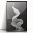 Framed abstract minimalist wall art featuring a sleek black design, showcasing geometric patterns and a modern aesthetic, perfect for contemporary decor.
