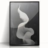 Framed abstract minimalist wall art featuring a sleek black design, showcasing geometric patterns and a modern aesthetic, perfect for contemporary decor.
