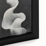 Abstract minimalist wall art featuring soft pastel colors in a geometric design, presented in a sleek black frame, perfect for modern home decor.