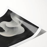 Abstract minimalist wall art print showcasing soft pastel colors and geometric shapes, elegantly rolled and ready for display or framing, perfect for modern decor.