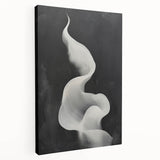Abstract minimalist wall art on stretched canvas showcasing a soft color palette of muted blues and whites, creating a serene and modern aesthetic for home decor.