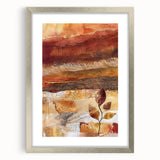 Textured abstract art print depicting autumn leaves in orange and red, framed in silver, suitable for bedroom decor.