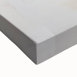 Close-up of a stretched canvas showcasing abstract minimalist wall art with earthy tones and geometric shapes, perfect for modern home decor.