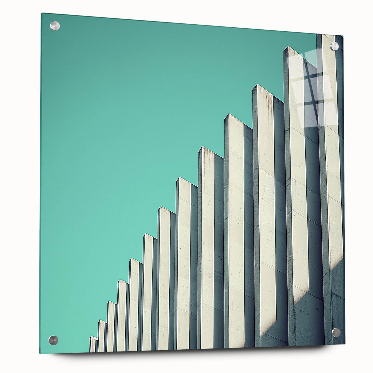 Abstract landscape artwork printed on acrylic glass, showcasing vibrant colors and dynamic shapes, displayed in a side view with decorative pins. This modern piece adds a contemporary touch to any space.