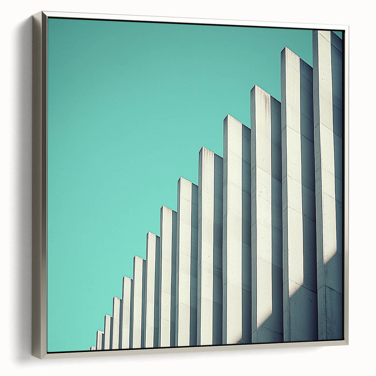 Framed abstract landscape canvas art in a silver frame, showcasing vibrant colors and dynamic shapes, ideal for modern home decor or office spaces.
