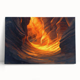Stretched canvas artwork showcasing a vibrant landscape with intricate cave formations, displayed leaning against a neutral wall, perfect for home decor.