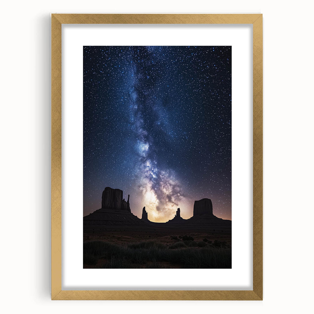 Elegant desert landscape framed in gold with a white mat, showcasing vibrant hues of orange and blue, perfect for modern home decor. Ideal for enhancing living spaces.