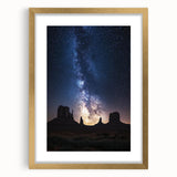 Elegant desert landscape framed in gold with a white mat, showcasing vibrant hues of orange and blue, perfect for modern home decor. Ideal for enhancing living spaces.