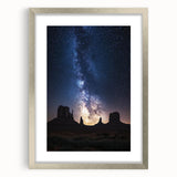 Framed landscape print depicting a serene desert scene with vibrant colors, encased in a silver mat, ideal for home decor and art lovers.