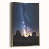 Framed canvas artwork showcasing a vibrant desert landscape in warm gold tones, elegantly displayed from a side view, perfect for home decor and aesthetic enhancement.