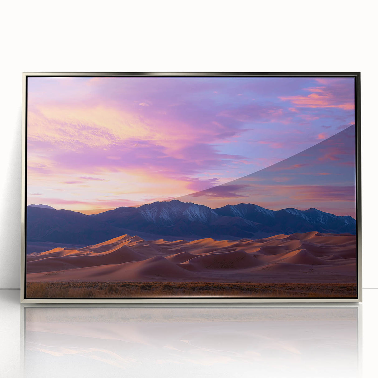 Framed acrylic artwork showcasing a serene desert landscape with rolling sand dunes, highlighted by a silver frame, perfect for modern home décor.
