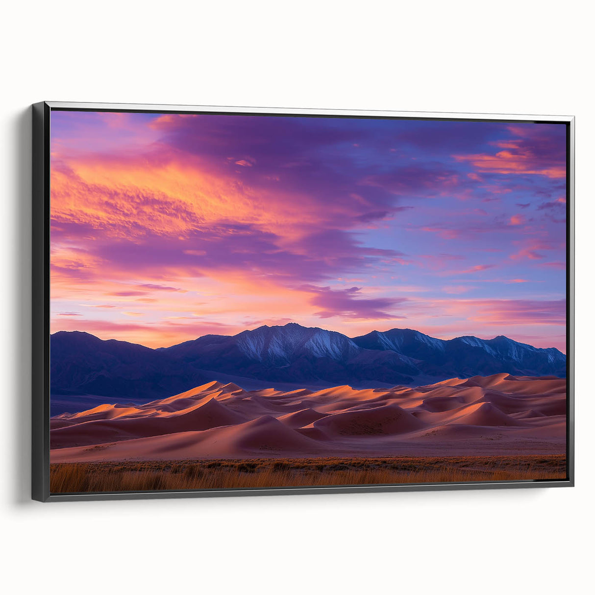 Framed canvas artwork depicting serene sand dunes in a desert landscape, featuring a black frame and side view, perfect for modern home decor and interior design.