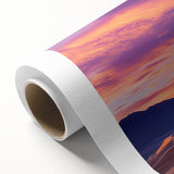 Rolled canvas artwork showcasing a serene desert landscape with golden sand dunes under a bright blue sky, designed for home décor and artistic display.