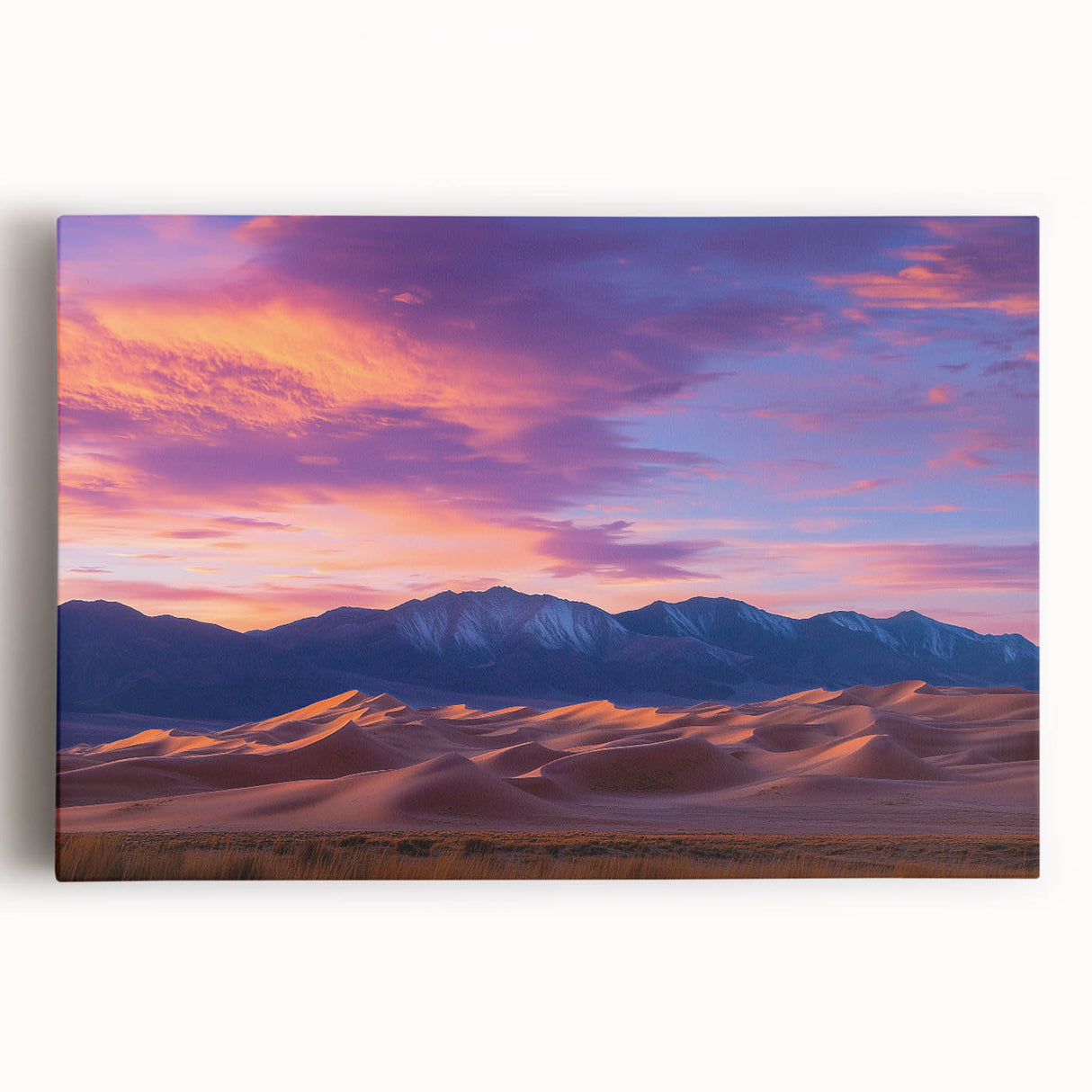 Stretched canvas artwork depicting serene desert dunes at sunset, showcasing soft golden sands and a vibrant gradient sky, perfect for modern home decor.
