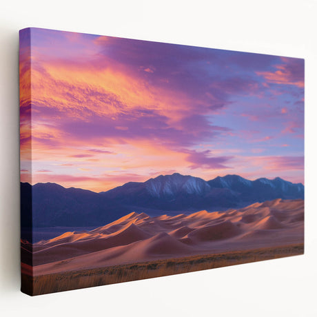 Stretched canvas artwork showcasing a serene landscape of rolling sand dunes at sunset, featuring warm hues of orange and gold, ideal for modern interior decor.