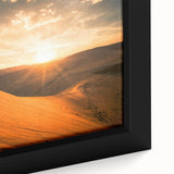 Black wall art depicting a textured African landscape in vibrant colors on a framed canvas, ideal for living room decor.