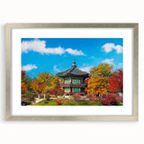 Textured abstract art print depicting a serene Korean landscape in muted earth tones, framed in silver.