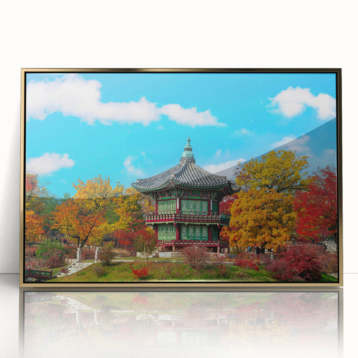 Large art print of a serene Korean landscape in muted earth tones, framed in gold acrylic, suitable for modern nursery decor.