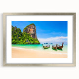 Textured art depicting an abstract scenery of Thailand in muted earth tones on a framed silver mat.