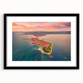 Colorful abstract art print of a European scenery in vibrant hues on a black framed canvas, ideal for living room decor.