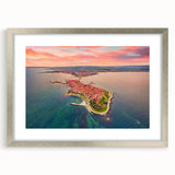 Extra large abstract art print depicting textured European scenery in muted earth tones, framed in silver.