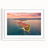 Textured abstract art print of a European scenery in muted earth tones on a framed white mat, ideal for bedroom wall decor.