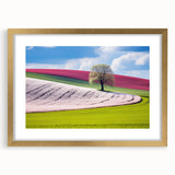 Abstract art print of a European cityscape in muted gray and gold tones on a framed canvas, suitable for dining room decor.